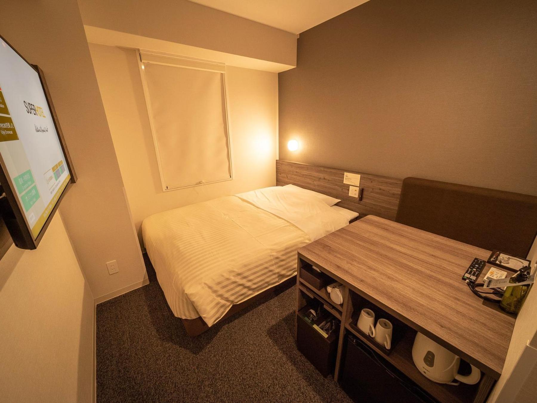 Super Hotel Kumamoto Ekimae Natural Hot Springs Екстер'єр фото